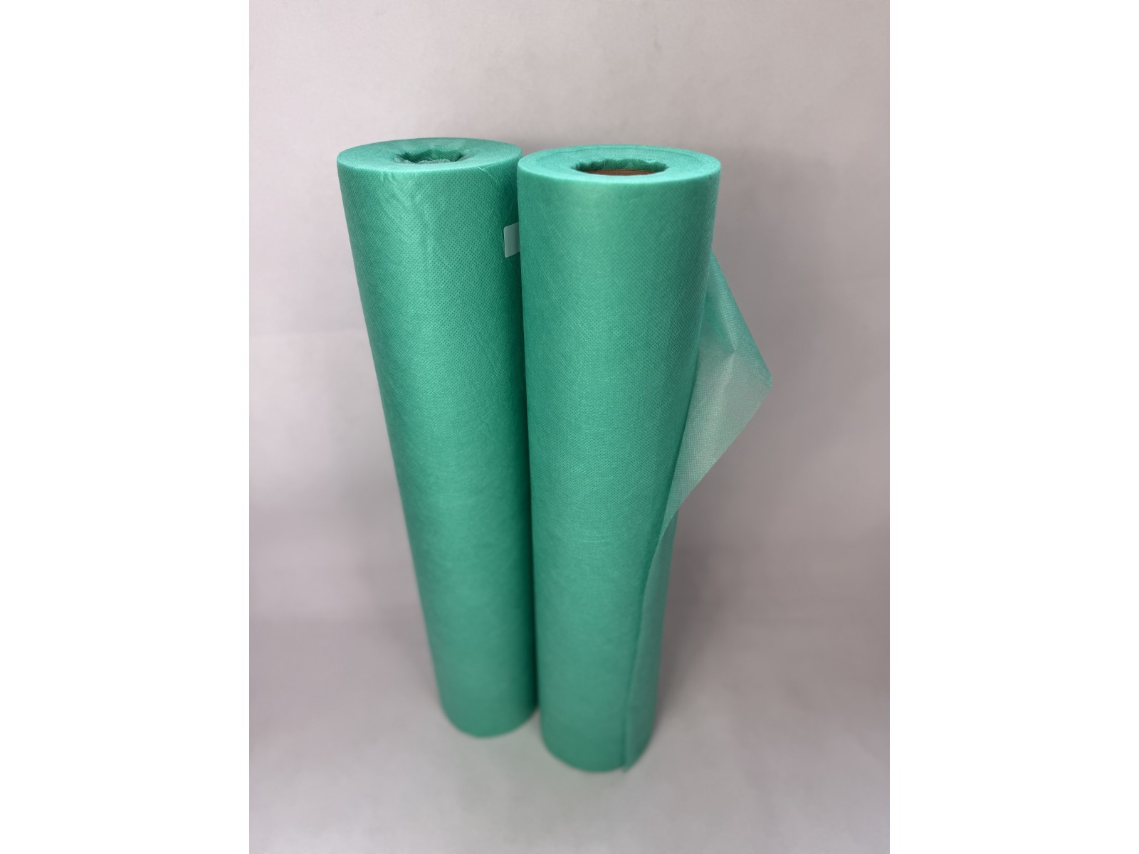 Vienkartinis paklotas (flizelinas) 60cm x 50m su perforacija, žalias | Disposable sheet (non-woven) 60cm x 50m, with perforation, green