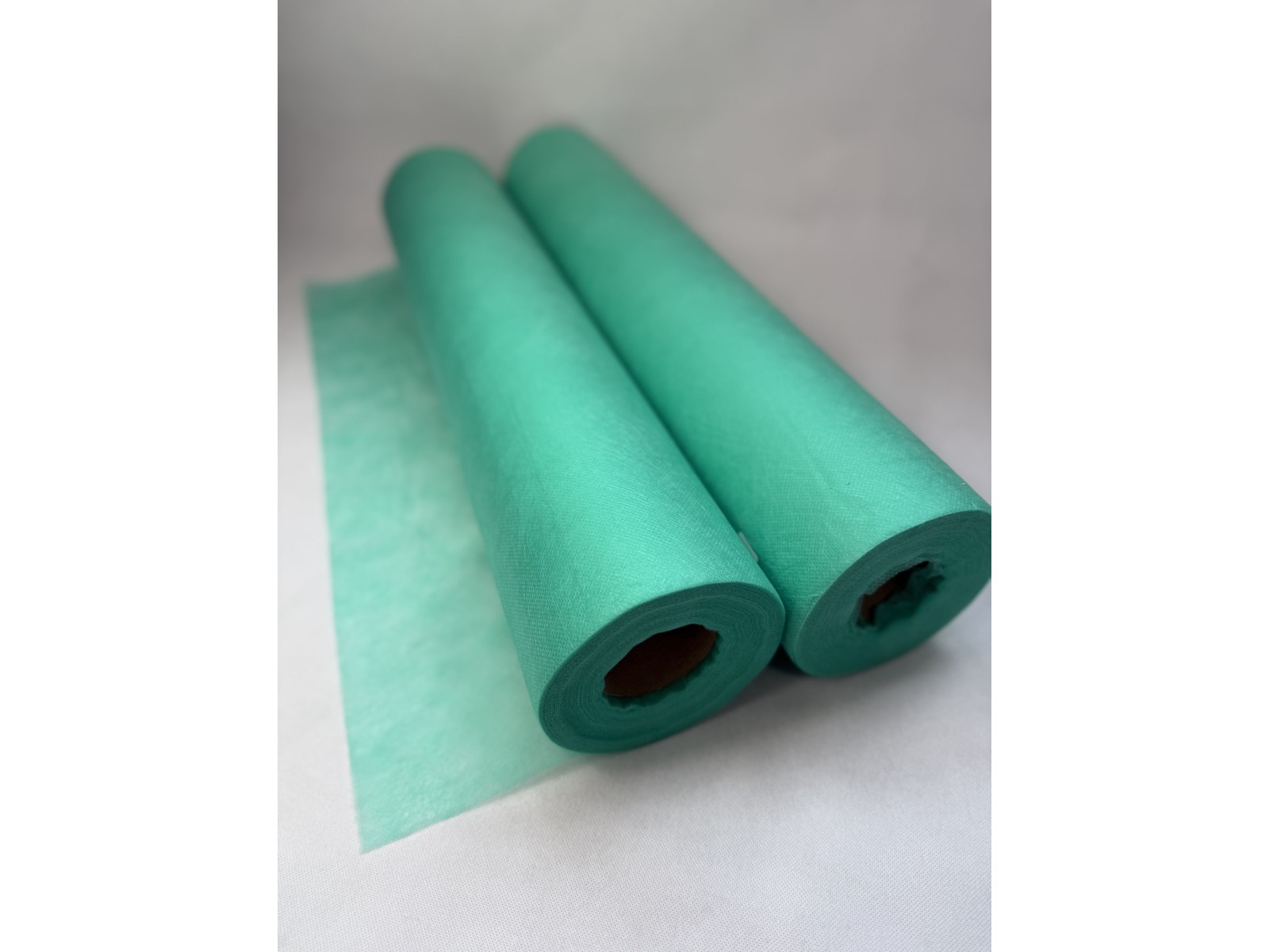 Vienkartinis paklotas (flizelinas) 60cm x 50m su perforacija, žalias | Disposable sheet (non-woven) 60cm x 50m, with perforation, green